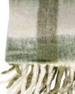 Olive green checked tassel cosy throw by Gisela Graham, soft furnishings with tassel accents and cozy fabric design.
