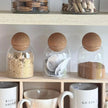 Starlight Express glass cork ball lidded pantry storage jar for kitchen and dining, with a clear glass body and cork lid.