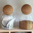 Starlight Express glass storage jar with cork ball lid, ideal for pantry organization and kitchen storage.