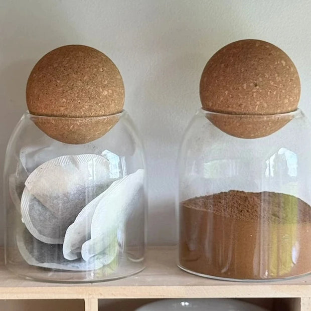 Starlight Express glass storage jar with cork ball lid, ideal for pantry organization and kitchen storage.