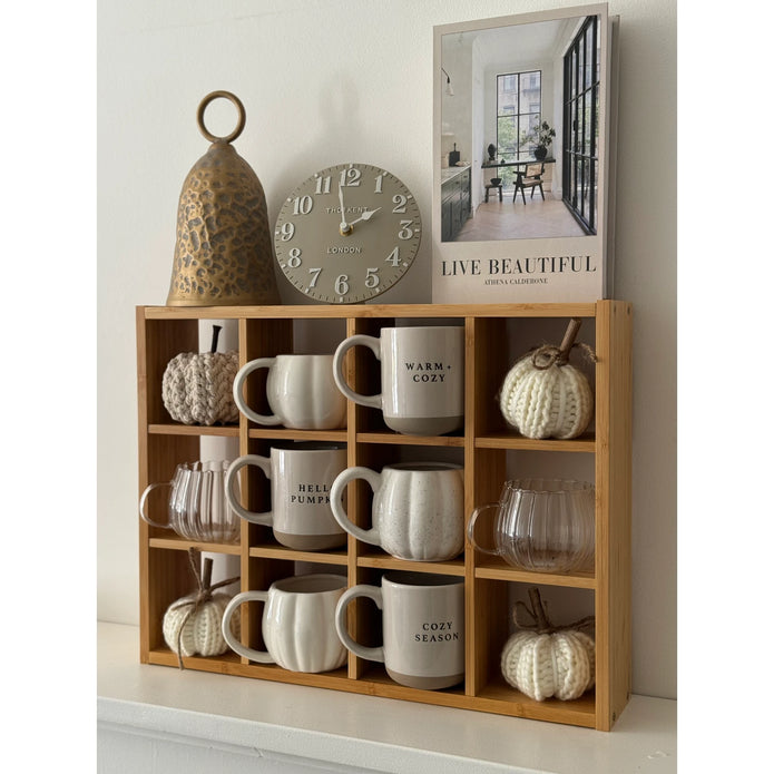Glass Pumpkin Mug, clear pumpkin mugs arranged in a wooden mug shelf