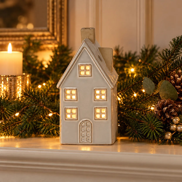 Satchville glazed ceramic Christmas house ornament with textured detail and LED lighting