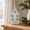 Textured ceramic house in winter daylight