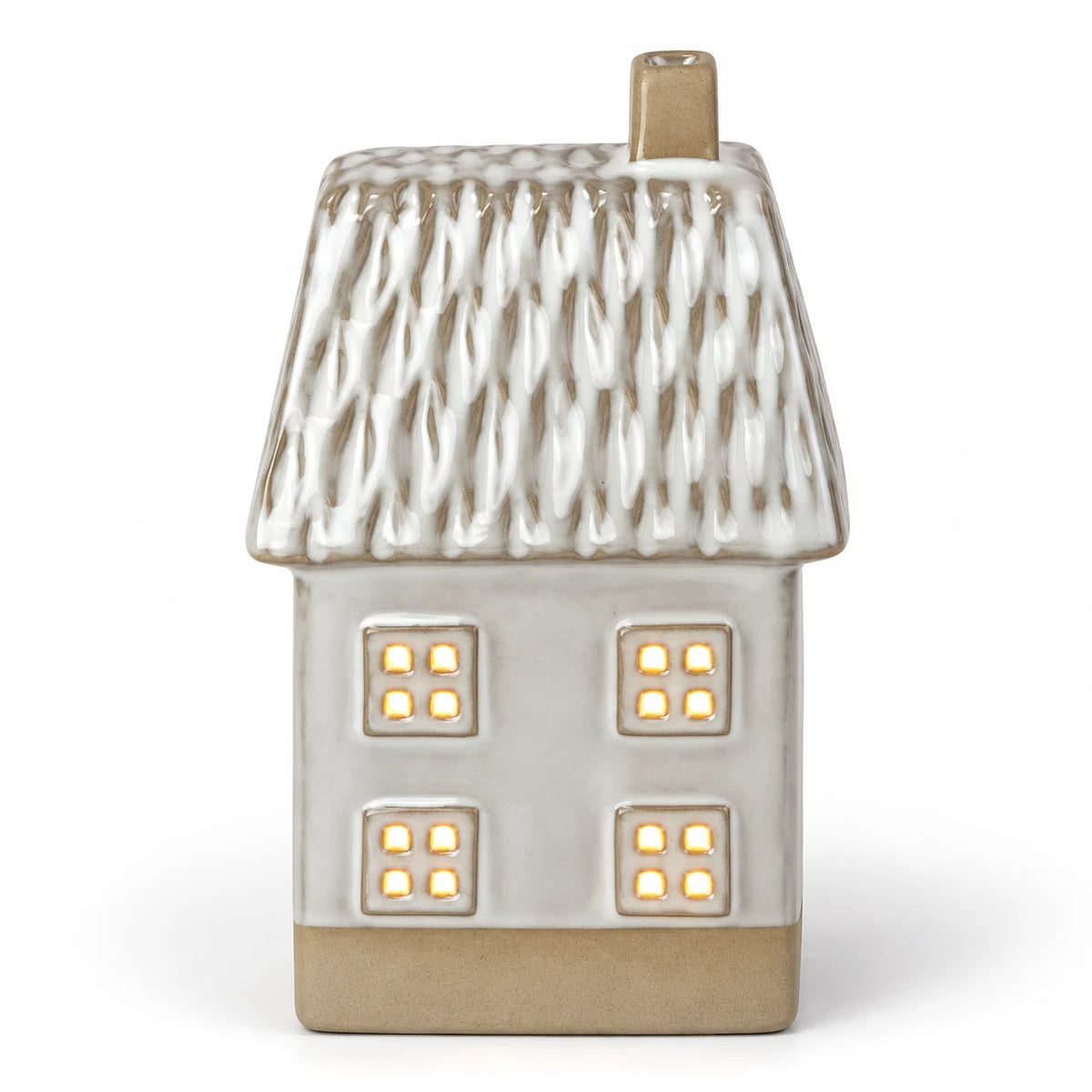 Lit studio view of glazed ceramic LED house with four square front windows