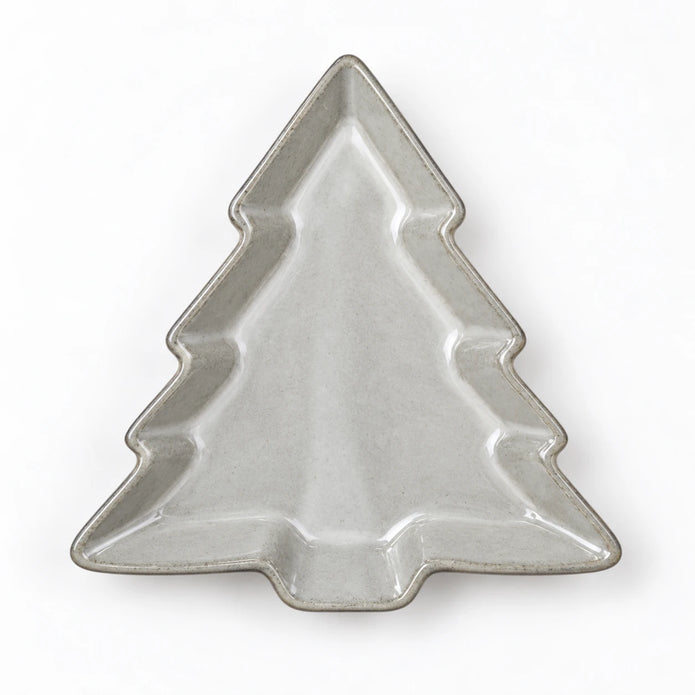 Glazed ceramic tree dish lying flat, empty overhead white studio view