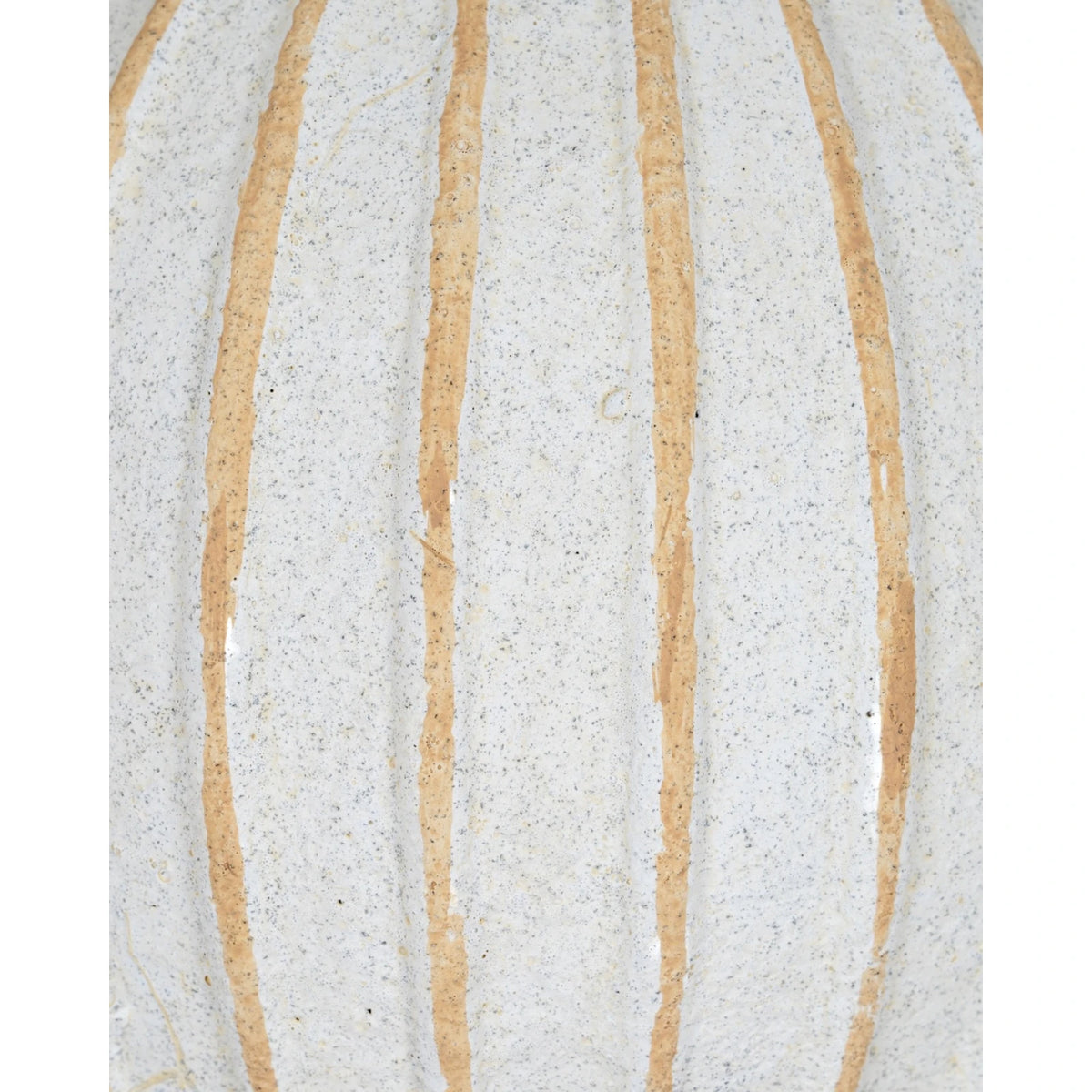 Decorative globe ball with striped pattern, used as a home décor accent by Hill Interiors.