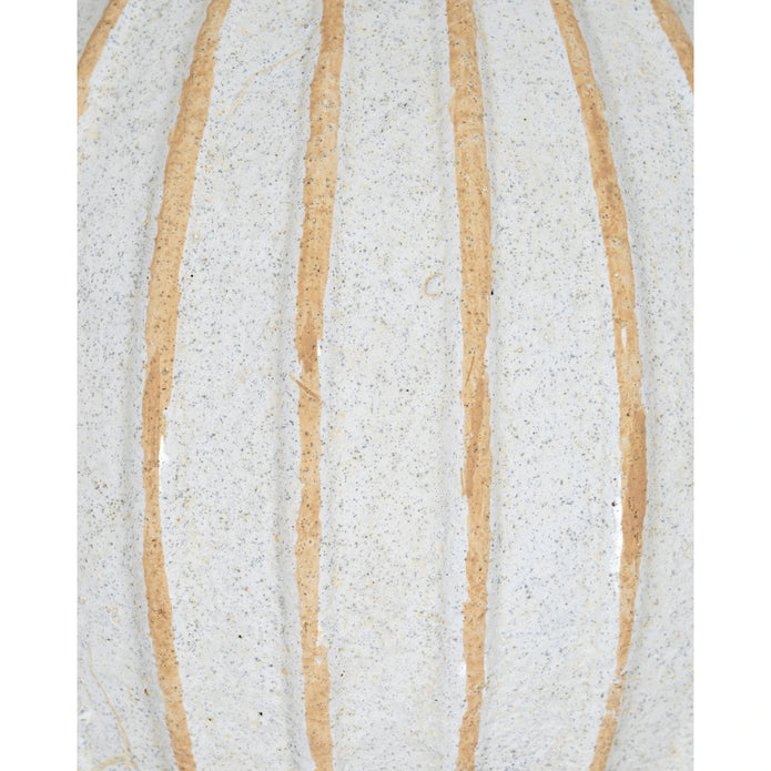 Decorative globe ball with striped pattern, used as a home décor accent by Hill Interiors.