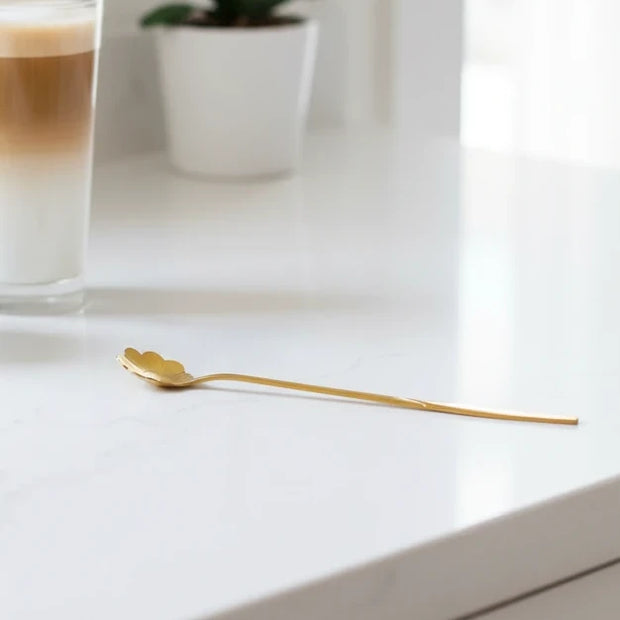 Gold flower long latte spoon by Starlight Express with a detailed floral design and elegant long handle.