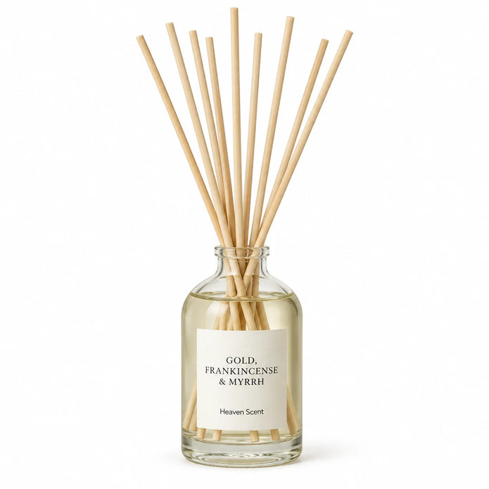 Gold, Frankincense And Myrrh Reed Diffuser on white with natural reeds inserted.