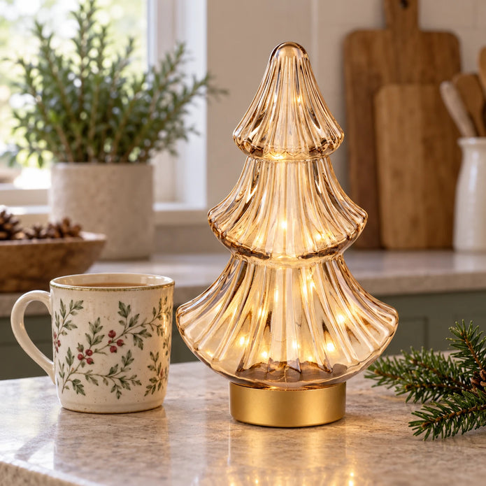 Gold LED Christmas tree lamp by Candlelight Products Ltd with glowing lights, perfect for holiday decor.