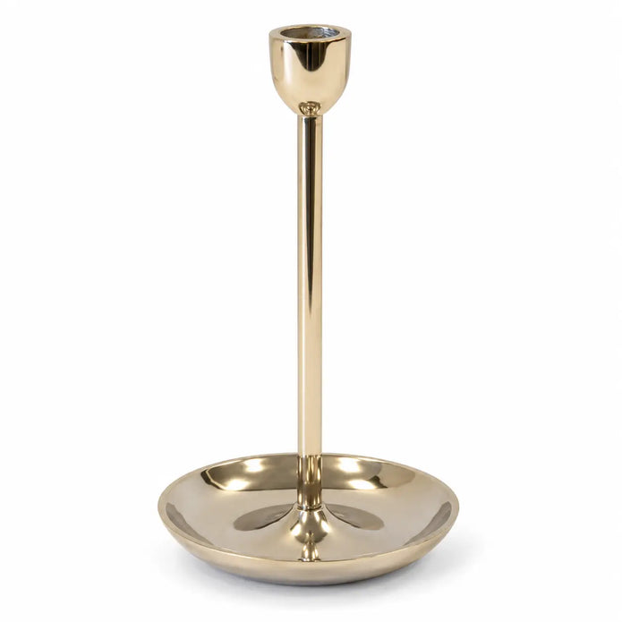 large gold metal candlestick holder empty on a white studio background