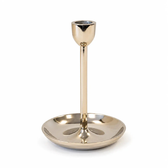Small gold metal candlestick holder by Satchville, featuring a sleek design perfect for holding a standard candle.