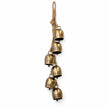 Complete six-cowbell gold garland with natural jute hanging loop on a white background