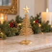 Gold metal spiral Christmas tree, small styled mantel view (fine wire)