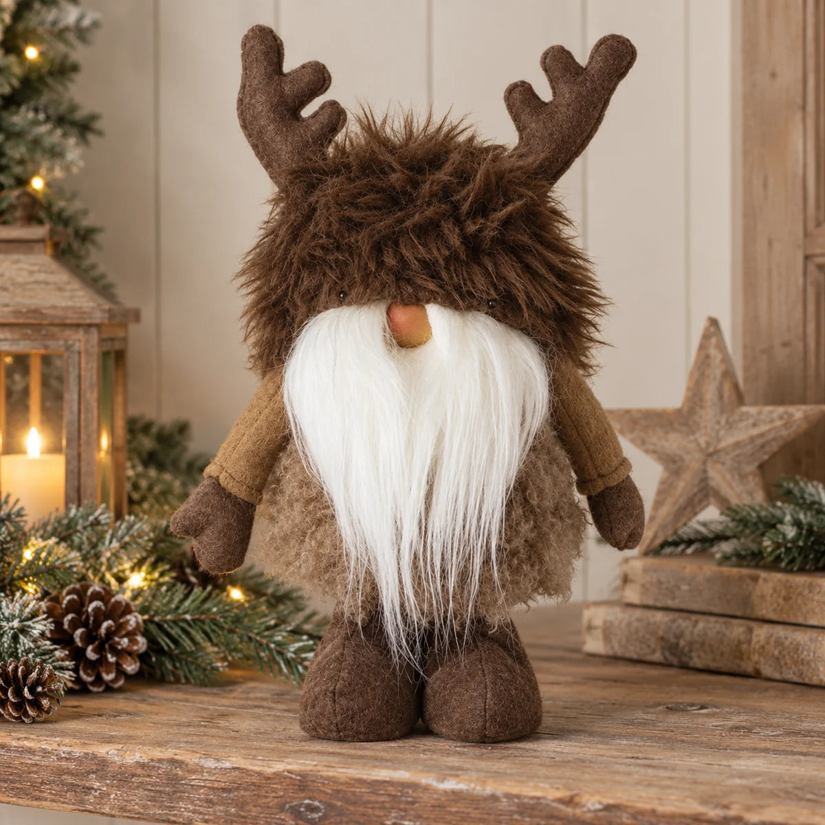 Christmas reindeer gonk with brown felt antlers and long white beard on wooden country-home shelf