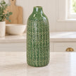 medium green ceramic vase empty on a pale stone kitchen counter