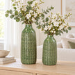 Small 29cm and medium 38cm green ceramic vases with white flowers, shown together for size comparison; sold separately
