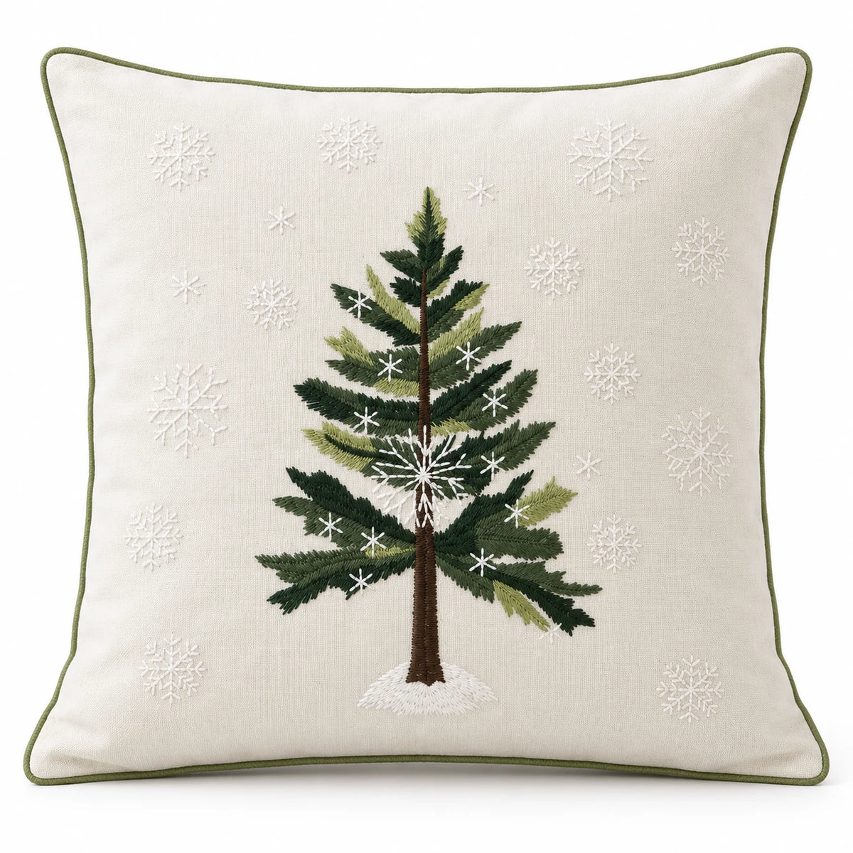 Front studio view of the green Christmas tree cushion cover with white snowflakes and olive green piping.