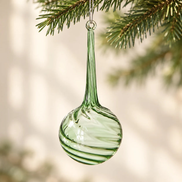 Green Glass Large Teardrop Bauble — Close-up of swirl glass bulb hanging on fir branch