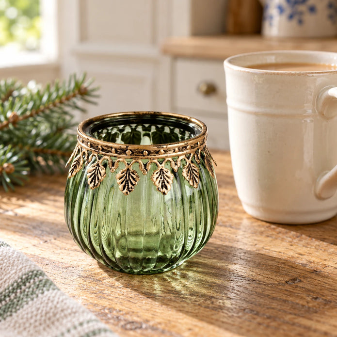 Green ribbed glass tea light candle holder by Originals International Ltd on a kitchen scale