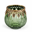 Green ribbed glass tea light candle holder by Originals International Ltd against a white background