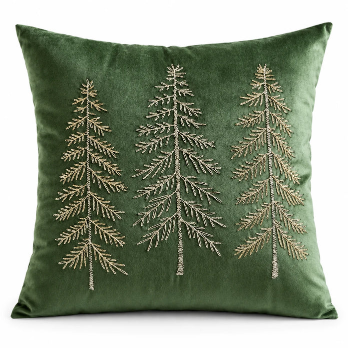 Front studio view of the green velvet cushion cover with three fine embroidered Christmas trees on a white background.