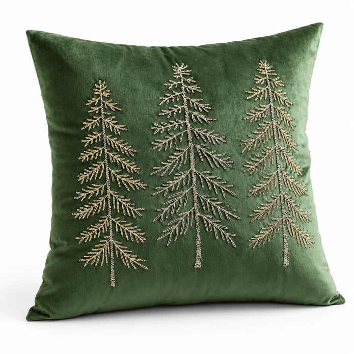 Angled studio view of the green velvet embroidered tree cushion cover showing its texture and tree design.