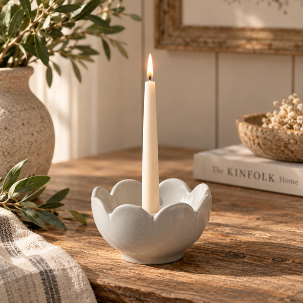 Grey ceramic flower candle holder by Wikholmform, designed for elegant home decor with a floral-inspired shape.
