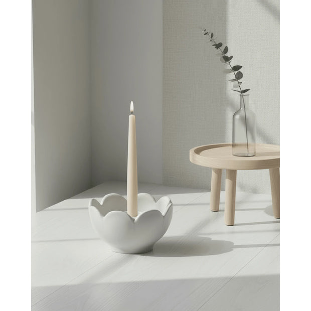 Grey ceramic flower candle holder by Wikholmform, designed for elegant home decor with a floral motif.