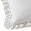 Hallie white cushion cover close-up showing the gathered ruffle and stitching