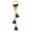 Complete hanging forest green bell decoration with jute hoop and hessian bow on a white studio background.