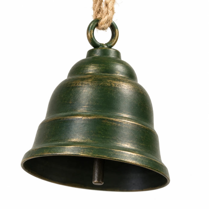 Close-up of a forest green metal bell and its natural jute hanging cord.