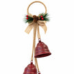 Detail of the red bell decoration showing its jute hoop, hessian bow, pinecones and festive sprigs