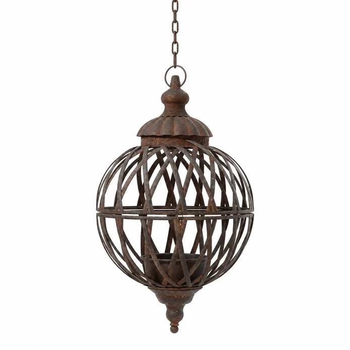 Small hanging rusty metal lattice ball planter, empty on a white studio background.