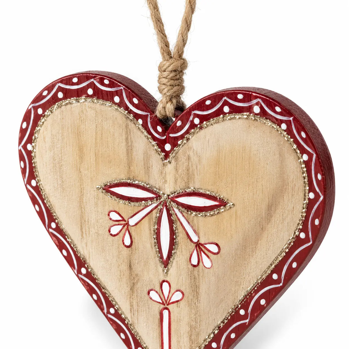 Close-up of twine hanger, patterned red border and gold-coloured edging on a wooden heart