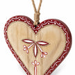 Close-up of twine hanger, patterned red border and gold-coloured edging on a wooden heart