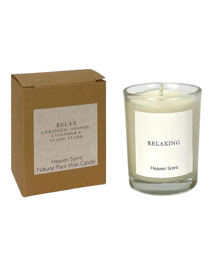 Relaxing small candle by Heaven Scent Incense Ltd, featuring a simple glass holder and a softly glowing wick.