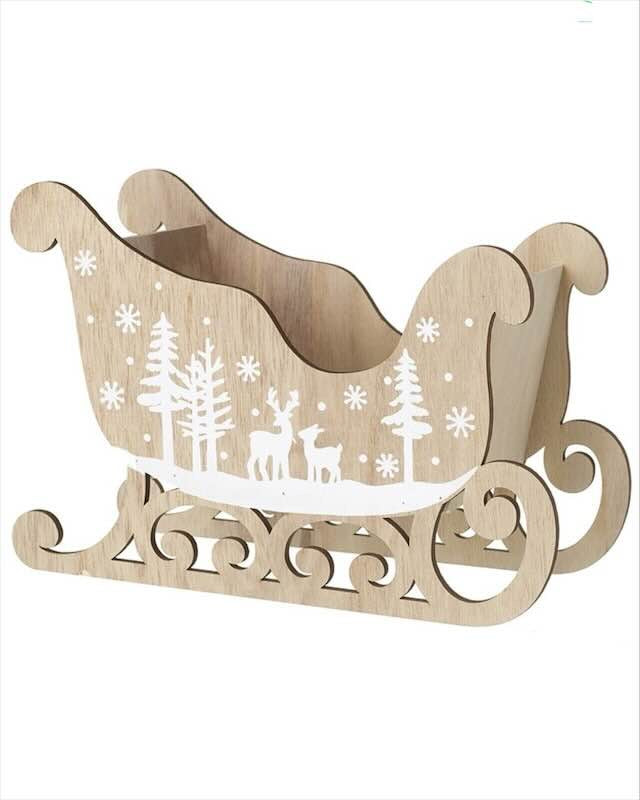 Beige wooden Christmas sleigh decorated for holiday season, featuring intricate wood details and festive design by Heaven Sends