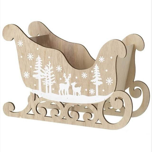 Beige wooden Christmas sleigh decorated for holiday season, featuring intricate wood details and festive design by Heaven Sends