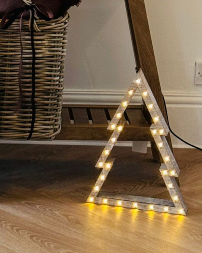 Beige wooden LED light-up Christmas trees by Heaven Sends, small decorative holiday trees with warm illumination.