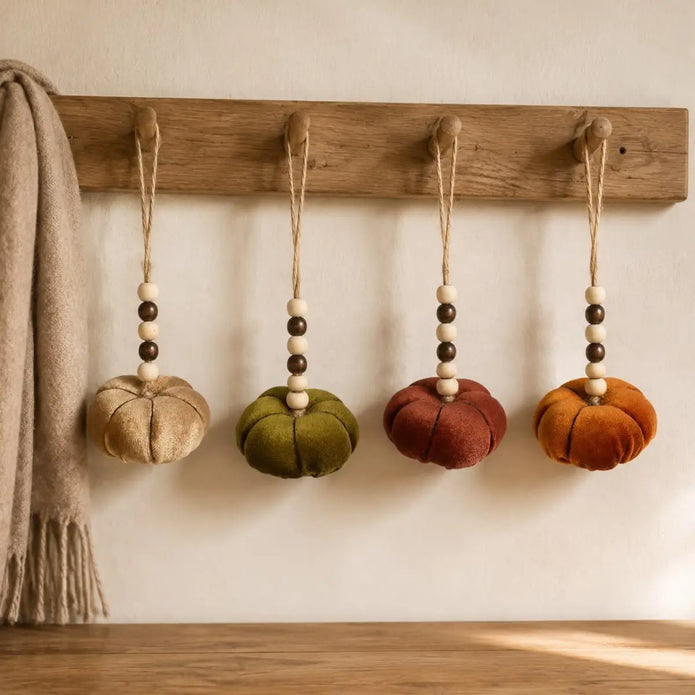 Velvet pumpkins with bead hangers, autumn decor by Heaven Sends, featuring soft fabric pumpkins with decorative bead accents.