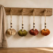 Velvet pumpkins with bead hangers, autumn decor by Heaven Sends, featuring soft fabric pumpkins with decorative bead accents.