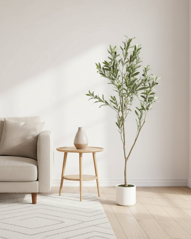 Small artificial faux olive tree by Hill Interiors, realistic plant with green leaves and a sturdy pot.