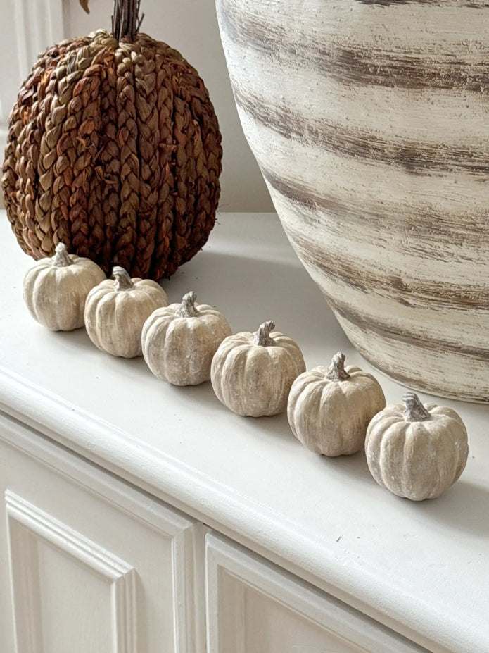 Set of six small wooden-carved ceramic pumpkins for autumn decor by Hill Interiors, featuring intricate carved details.