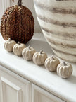 Set of six small wooden-carved ceramic pumpkins for autumn decor by Hill Interiors, featuring intricate carved details.