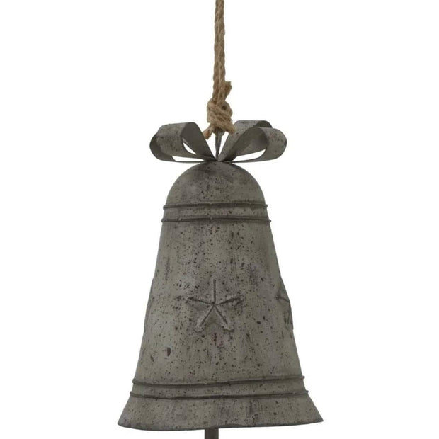 Rustic metal hanging Christmas bell with a decorative bow, perfect for holiday decor from Hill Interiors.
