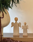 Rustic wooden angel ornament for Christmas, crafted from natural wood, by Hill Interiors, featuring a handcrafted angel design.