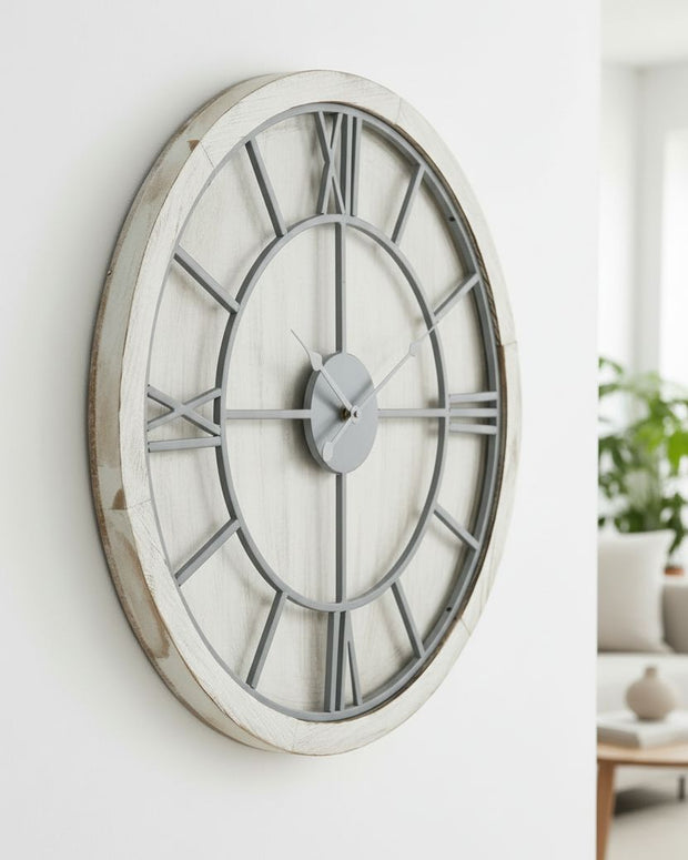 White medium round wooden Williston wall clock by Hill Interiors, featuring a classic design with black hour and minute hands.