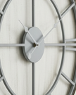 White medium round wooden Williston wall clock by Hill Interiors, featuring a sleek design and classic clock face.