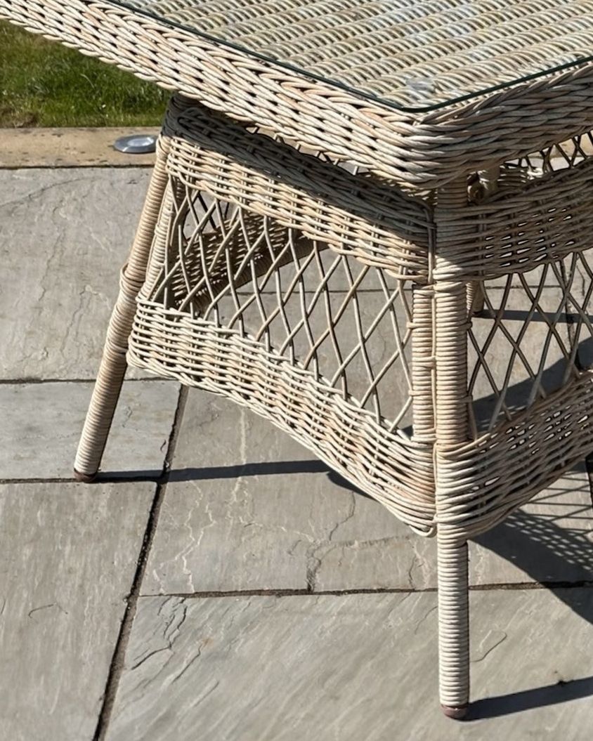 Outdoor 4-seater dining set from Hill Interiors' Rattan Provence Collection, featuring garden furniture with woven rattan design.